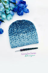 elixir beanie featuring blue ombre mandala yarn crocheted in a textured stitch pattern thumbnail
