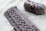 Crochet Scarf Beside A Yarn thumbnail