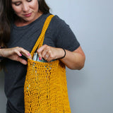 Crochet Bag Worn By A Woman thumbnail
