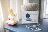 yarn ball winder next to box with yarn on top thumbnail