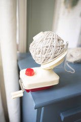 Yarn ball winder attached to a dresser winding medium weight yarn thumbnail