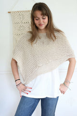 Knitted Poncho Worn By A Woman thumbnail