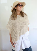 Knitted Poncho Worn By A Woman thumbnail
