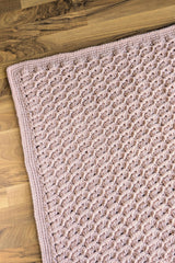 close-up of corner of pink crochet blanket thumbnail
