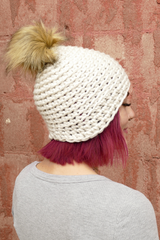 White hat with pom thumbnail