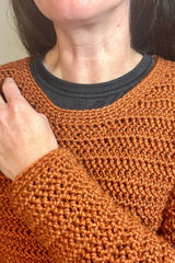 closeup of crochet sweater thumbnail