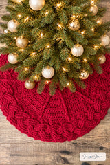 handmade red and white cable braid crochet skirt displayed under Christmas tree thumbnail