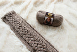 Crochet Scarf Beside A Yarn thumbnail
