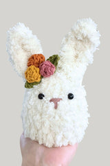 sherpa stuffed bunny in a hand thumbnail