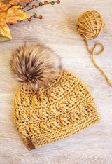 crochet hat with pom thumbnail