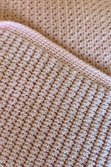 close-up of dusty rose waffle wave crocheted blanket thumbnail