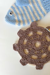 fish overn mitt and wheel trivet with a crochet hook thumbnail