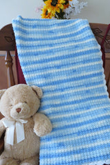 Crochet Blanket Beside A Teddy Bear thumbnail