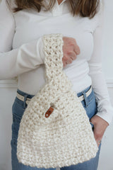 Crochet Bag Held By A Woman thumbnail