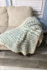 Blue and cream blanket thumbnail