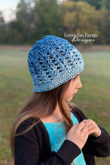 elixir beanie featuring blue ombre mandala yarn crocheted in a textured stitch pattern on girl thumbnail
