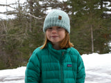 Knitted Hat Worn By A Girl thumbnail