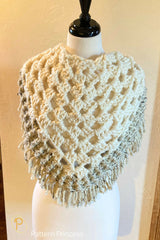 model torso wearing a crocheted yellow light shade poncho scarf thumbnail