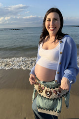 Knitted Sweater Held By A Woman thumbnail