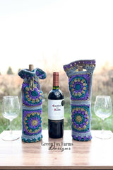 wine glasses, wine bags, and a bottle of wine on a table  thumbnail