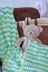 Two Crochet Blanket On Top Of Teddy Bear thumbnail