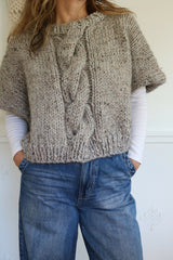 Knitted Poncho Worn By A Woman thumbnail