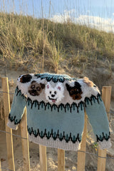 Knitted Sweater Hanged On The Fence thumbnail