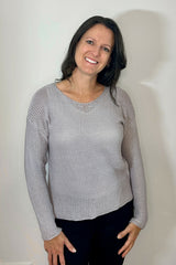 woman wearing knit sweater thumbnail