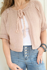 Knitted Cardigan Worn By A Woman thumbnail