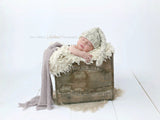 Knitted Hat Worn By A Baby thumbnail