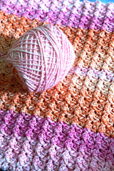 Close up of blanket and yarn ball thumbnail