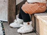 Crochet Boots Worn By A Baby thumbnail