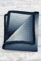 Blanket on wood background thumbnail