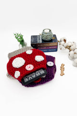 purple and red toadstool mushroom-shaped crocheted sleeve thumbnail