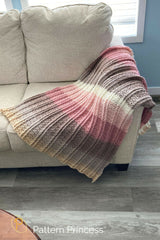 Blushing Hygge Baby Blanket on Sofa thumbnail