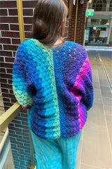 Crochet Cardigan Worn By A Woman Back View thumbnail
