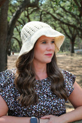 Crochet Hat Worn By A Woman thumbnail
