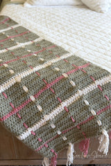 crocheted sage green tartan plaid throw blanket featuring cream and rose woven vertical stripes and fringe tassel ends thumbnail