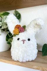 sherpa stuffed bunny on a shelf thumbnail