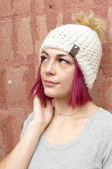 White hat with pom thumbnail