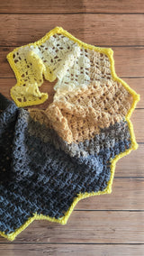 Black Crochet Scarf On The Floor thumbnail