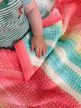 Crochet Blanket Held By A Child thumbnail
