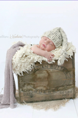 Knitted Hat Worn By A Baby thumbnail