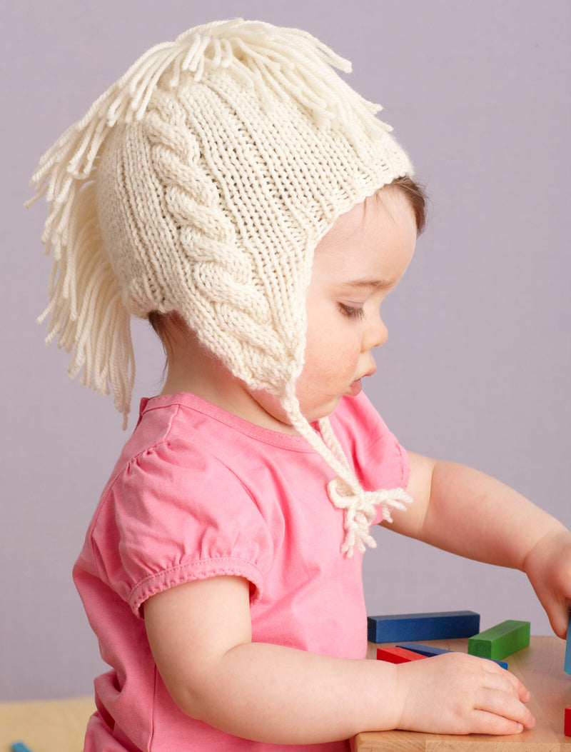 Cabled And Fringed Hat Pattern (Knit)