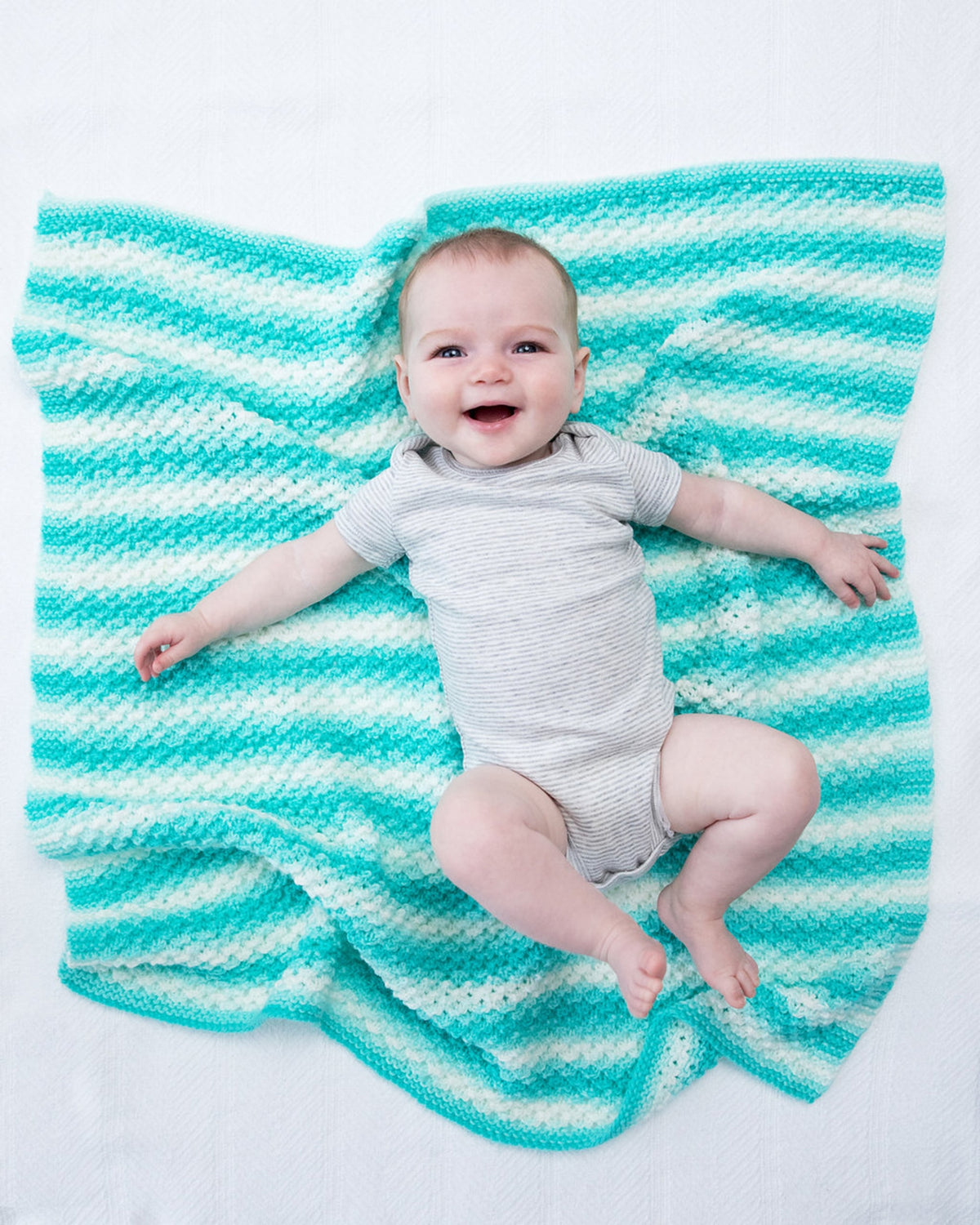 Textured Baby Afghan (Knit) Lion Brand Yarn