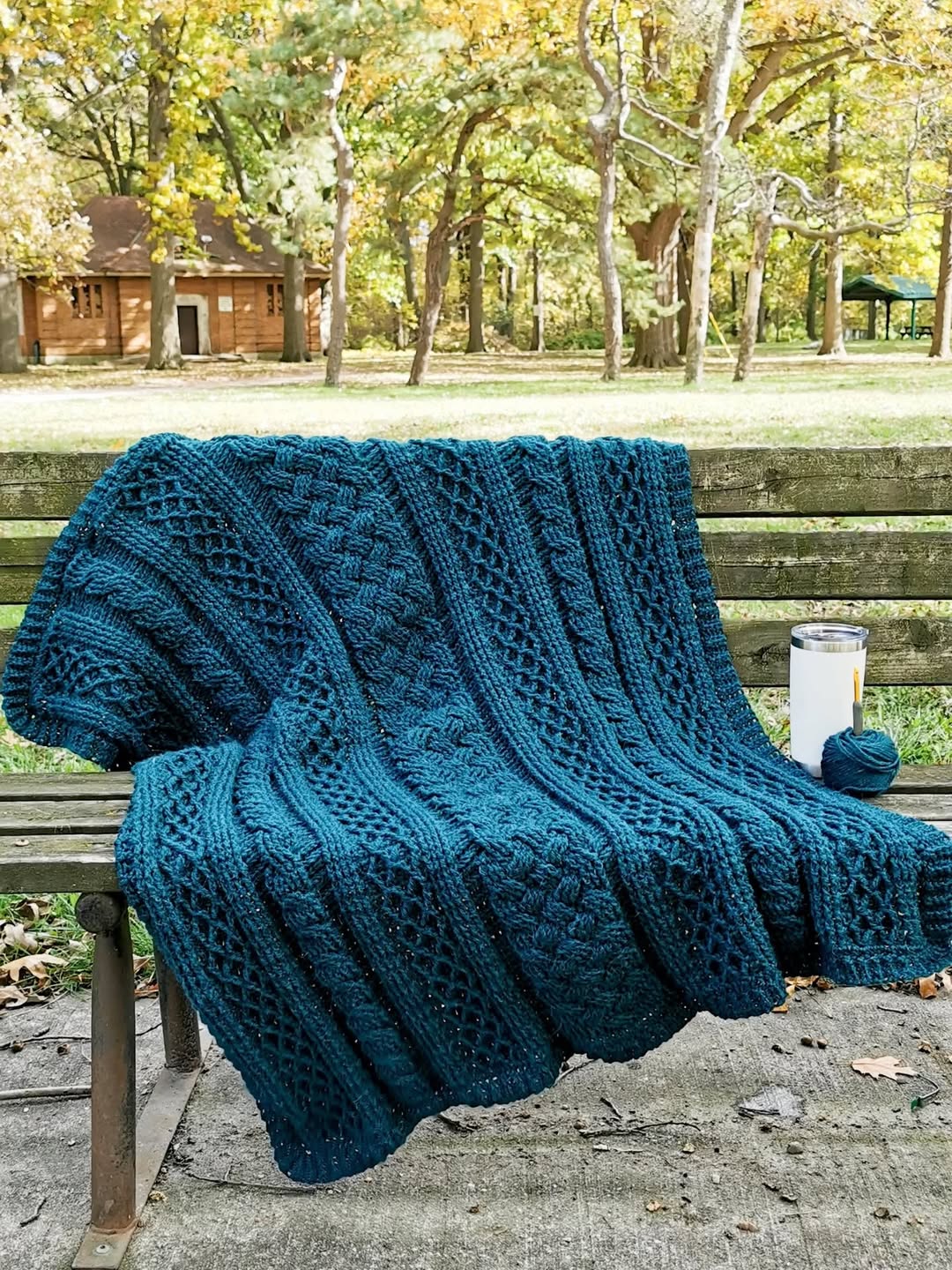 Hands knitting with grey yarn - view on Lion Brand Instagram