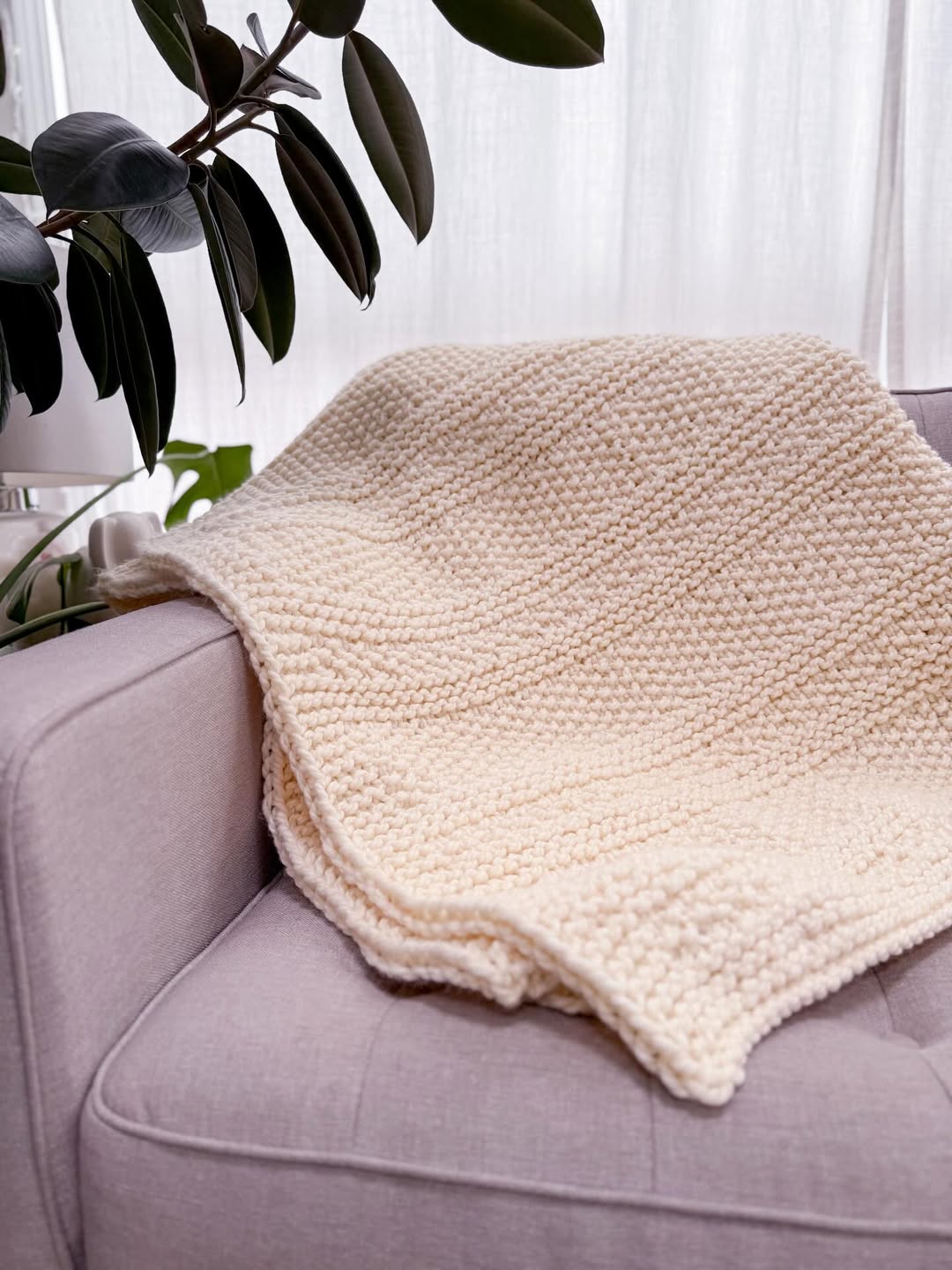 Chunky cream knit blanket - view on Lion Brand Instagram