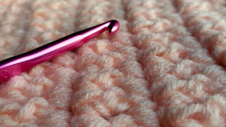 Diverse women crocheting with worsted yarn and hooks