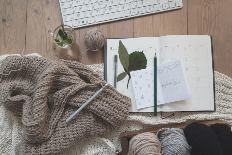 Woman crocheting colorful blanket in cozy nook